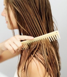 Use a wide toothed comb and work from the ends up!