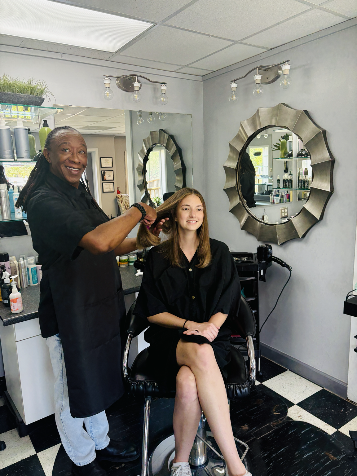 “Soft dimensional brunette highlights and face-framing layers at Salon International Mount Pleasant SC”