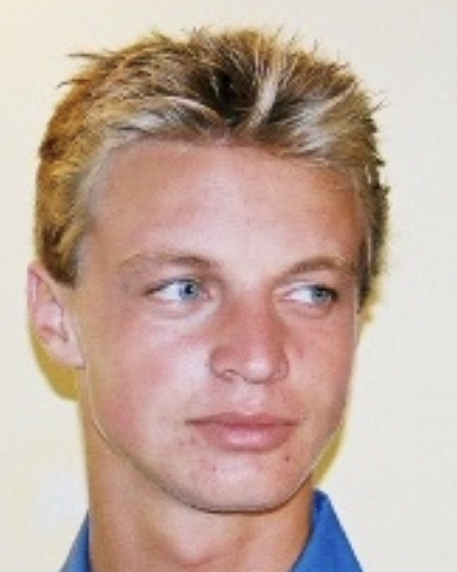 Young man with textured blonde haircut after dreadlock removal at Salon International in Mount Pleasant SC